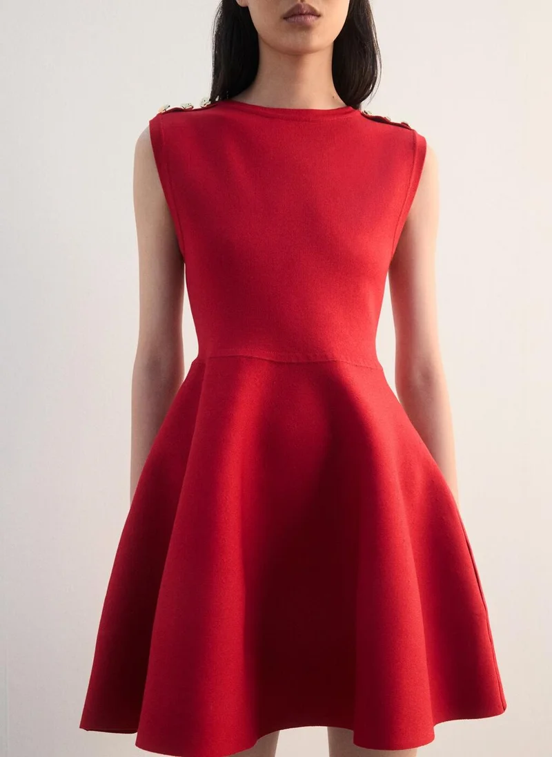 Mango  Peplum knit dress with buttons for Women | Best Price UAE
